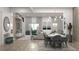 Bright, open-concept living room and dining area with modern lighting and neutral decor at Lot 8 Blk 285 Houston Ln, North Port, FL 34287