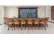 This community recreation room bar area has seating for eight and a beautiful mural behind the bar at 10055 Links Ln # 402, Rotonda West, FL 33947