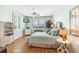 Light and airy bedroom with plantation shutters and coastal decor at 10055 Links Ln # 402, Rotonda West, FL 33947