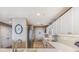 Well-lit kitchen featuring stainless steel appliances and ample counter space at 10055 Links Ln # 402, Rotonda West, FL 33947