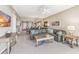 Spacious living room with comfortable seating and lots of natural light at 10055 Links Ln # 402, Rotonda West, FL 33947