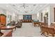 This community recreation room has a bar, billiards table, comfortable seating and plenty of lighting at 10055 Links Ln # 402, Rotonda West, FL 33947