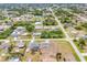 A neighborhood aerial view showing the home's proximity to surrounding houses and local streets at 10060 Amelia Ave, Englewood, FL 34224