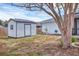 The backyard features a storage shed adjacent to the home at 10060 Amelia Ave, Englewood, FL 34224