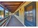 Exterior view of a hallway with a door numbered nine at 11 Quails Run Blvd # 9, Englewood, FL 34223