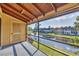 Charming screened porch provides a peaceful retreat with scenic views at 11 Quails Run Blvd # 9, Englewood, FL 34223