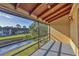 Relaxing screened porch offers serene views of the canal at 11 Quails Run Blvd # 9, Englewood, FL 34223