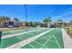 Shuffleboard courts with well-maintained playing surfaces, offering a fun recreational activity for residents at 11 Quails Run Blvd # 9, Englewood, FL 34223