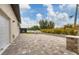 Expansive backyard patio area perfect for outdoor entertaining and relaxation at 11101 Sandrift Ave, Englewood, FL 34224