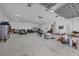 Spacious garage with multiple bays, high ceilings, and plenty of room for storage at 11101 Sandrift Ave, Englewood, FL 34224