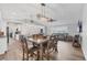 Open-concept living space with a dining area, kitchen and sitting area at 11101 Sandrift Ave, Englewood, FL 34224