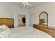 Bedroom showing closet and views of living areas with classic furnishings and ample natural light at 115 Australian Dr, Rotonda West, FL 33947