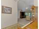 View of the living room, through the foyer, showcasing open layout and natural light at 115 Australian Dr, Rotonda West, FL 33947