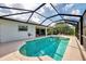 Sparkling screened-in pool with covered lanai area provides an ideal outdoor living and entertaining space at 115 Australian Dr, Rotonda West, FL 33947