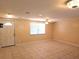 Spacious living room with tile floors, fan, and natural light at 1160 Sharlo Cir, Englewood, FL 34224