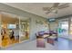 Lanai offering relaxing seating, serene ambiance, and views of the dining and living area at 1278 Lincoln Dr, Englewood, FL 34224
