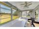 Lanai featuring comfortable seating, great natural light, and serene outdoor views at 1278 Lincoln Dr, Englewood, FL 34224