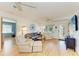 Bright living room features hardwood floors, neutral decor, and a beautiful ocean view at 1278 Lincoln Dr, Englewood, FL 34224