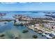 Coastal community homes with docks and boatlifts offer convenient access to tranquil bay waters and scenic waterfront views at 140 Crestview Dr, Englewood, FL 34223