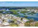 Waterfront community with private docks amidst lush mangrove islands, offering scenic and serene coastal living at 140 Crestview Dr, Englewood, FL 34223
