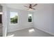 Bright bedroom with two windows offering natural light and views at 14526 Fort Worth Cir, Port Charlotte, FL 33981