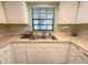 Kitchen sink with window at 149 Englewood Isles Pkwy # 609, Englewood, FL 34223