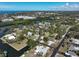 Expansive aerial view of waterfront community, showcasing canals, docks, and proximity to the ocean at 1493 Kathleen Pl, Englewood, FL 34223