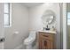 Modern bathroom featuring new fixtures, updated vanity, and contemporary design at 1493 Kathleen Pl, Englewood, FL 34223