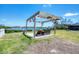 Outdoor seating with water views, offering a relaxing spot to enjoy the peaceful surroundings at 150 Crestview Dr, Englewood, FL 34223