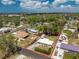 High aerial view showing the property's layout on the land and surrounding neighborhood at 1530 Philip Pl, Englewood, FL 34223