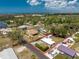 Aerial view featuring the property within its neighborhood and nearby waterways at 1530 Philip Pl, Englewood, FL 34223