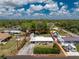 Aerial view of the property showing its layout and lot size within the surrounding community at 1530 Philip Pl, Englewood, FL 34223