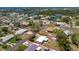 Aerial view of the property showcasing its location near waterways and the surrounding neighborhood at 1530 Philip Pl, Englewood, FL 34223