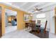 Comfortable dining room featuring a round table, seating for four, and ample natural light at 1530 Philip Pl, Englewood, FL 34223