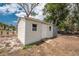 Backyard shed with a ramp and storage space at 1530 Philip Pl, Englewood, FL 34223
