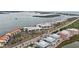 Scenic aerial view of condos near waterway with lush vegetation, highlighting its premier location at 1551 Beach Rd # 207, Englewood, FL 34223