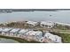 Aerial shot showcasing the complex, its proximity to the water, and beautiful surroundings at 1551 Beach Rd # 207, Englewood, FL 34223
