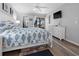 Bright main bedroom offers great closet space and access to a screened in balcony at 1551 Beach Rd # 207, Englewood, FL 34223