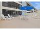 The condo's large patio is perfect for entertaining with plenty of seating at 1551 Beach Rd # 207, Englewood, FL 34223