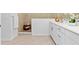 Elegant bathroom with a tiled shower, white vanity, and modern fixtures, providing a spa-like retreat at 17685 Boracay Ct # 202, Venice, FL 34293