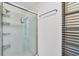 Bright bathroom featuring a modern shower with glass door and white subway tile at 18 Annapolis Ln, Rotonda West, FL 33947