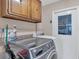 This is a functional laundry room with modern washer and dryer units at 18 Annapolis Ln, Rotonda West, FL 33947