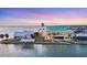 Stunning waterfront home with a private dock, lush landscaping, and a spacious layout at 1905 Mississippi Ave, Englewood, FL 34224
