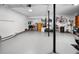 Clean garage with storage and space for recreational equipment at 2020 E Dolphin Dr, Englewood, FL 34223