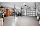 Spacious garage with organized storage and space for vehicles at 2020 E Dolphin Dr, Englewood, FL 34223