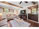 Inviting living area with a large TV and comfortable seating arrangements at 2020 E Dolphin Dr, Englewood, FL 34223