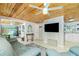 Bright living room featuring wood ceilings, modern furniture and stylish decor, creating a welcoming atmosphere at 221 Nippino E Trl, Nokomis, FL 34275