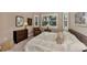 Comfortable bedroom with neutral tones, plantation shutters, and stylish furnishings create a relaxing atmosphere at 24181 Gallberry Dr, Venice, FL 34293