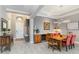 Home entryway combined with the dining area showcases modern design and functionality at 24181 Gallberry Dr, Venice, FL 34293