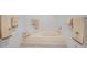 Inviting bathroom featuring a step-up tub with decorative towels hanging on the walls at 25188 Marion Ave # D308, Punta Gorda, FL 33950